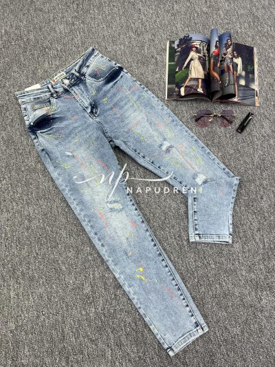 Дамски дънки с оранжеви пръски в светлосин цвят- код 6779